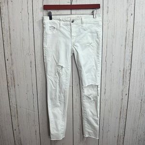 American Eagle Super Stretch X White Distressed Raw Hem Jeans Size 0